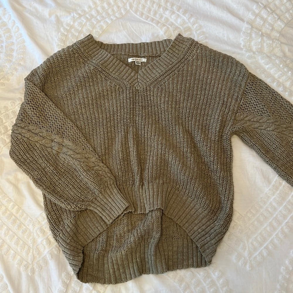 green sweater